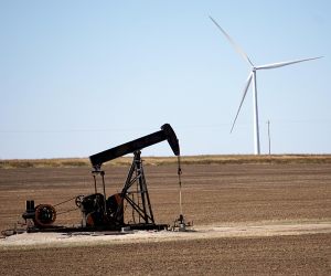 Picture of oil drilling rig and windmill. Meant to illustrate Waldroop Steel's Oklahoma Roots