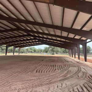Horse arena made of engineered steel frames showing the clearspan capability without interior columns